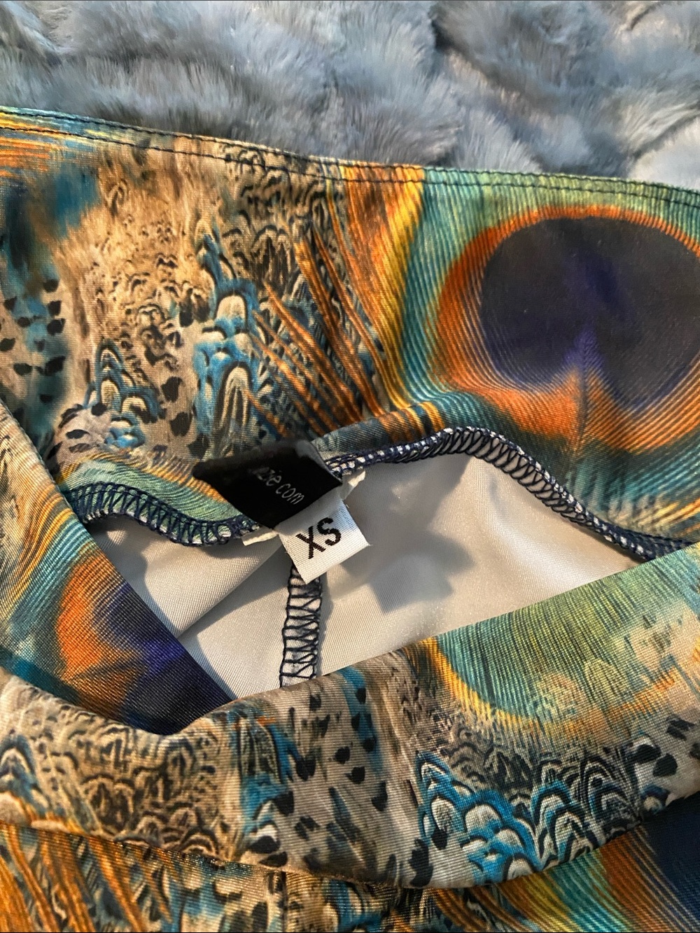 Onzie XS Peacock Print Leggings in Teal, Orange, Blue